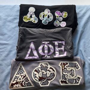 Delta Phi Epsilon stitched letter shirts